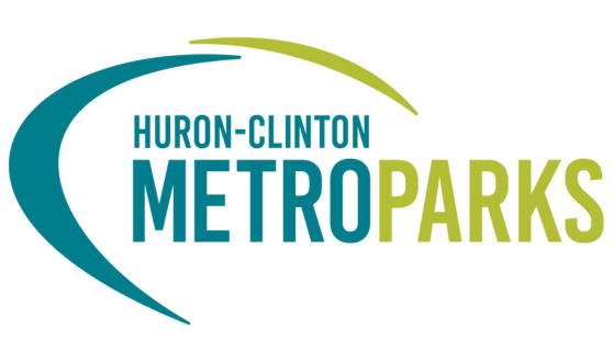 Swooshes in various shades of green with text Huron-Clinton Metroparks