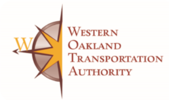 Half a compass with the W written on the left and text Western Oakland Transportation Authority